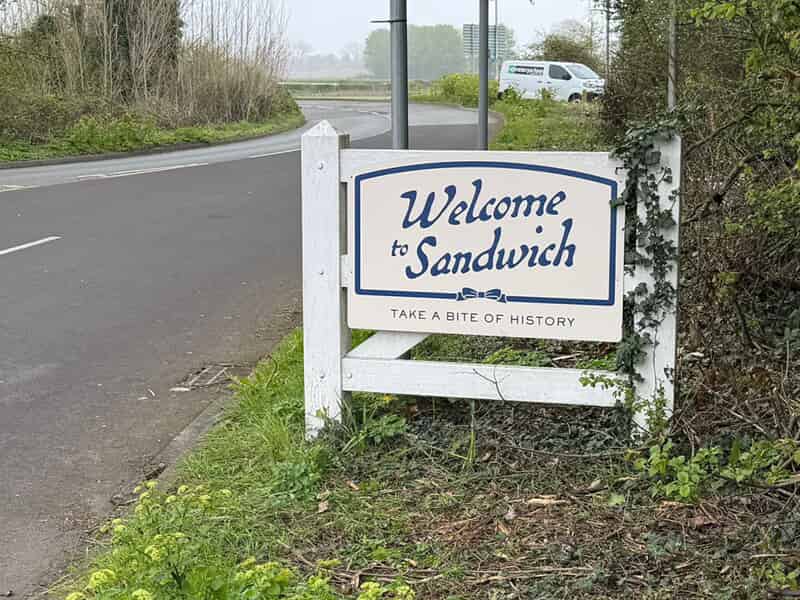 An image of the "Welcome to Sandwich - Take a Bite of History" monument sign.
